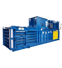 Large blue recycling equipment, designed for compacting and processing materials in industrial recycling facilities.