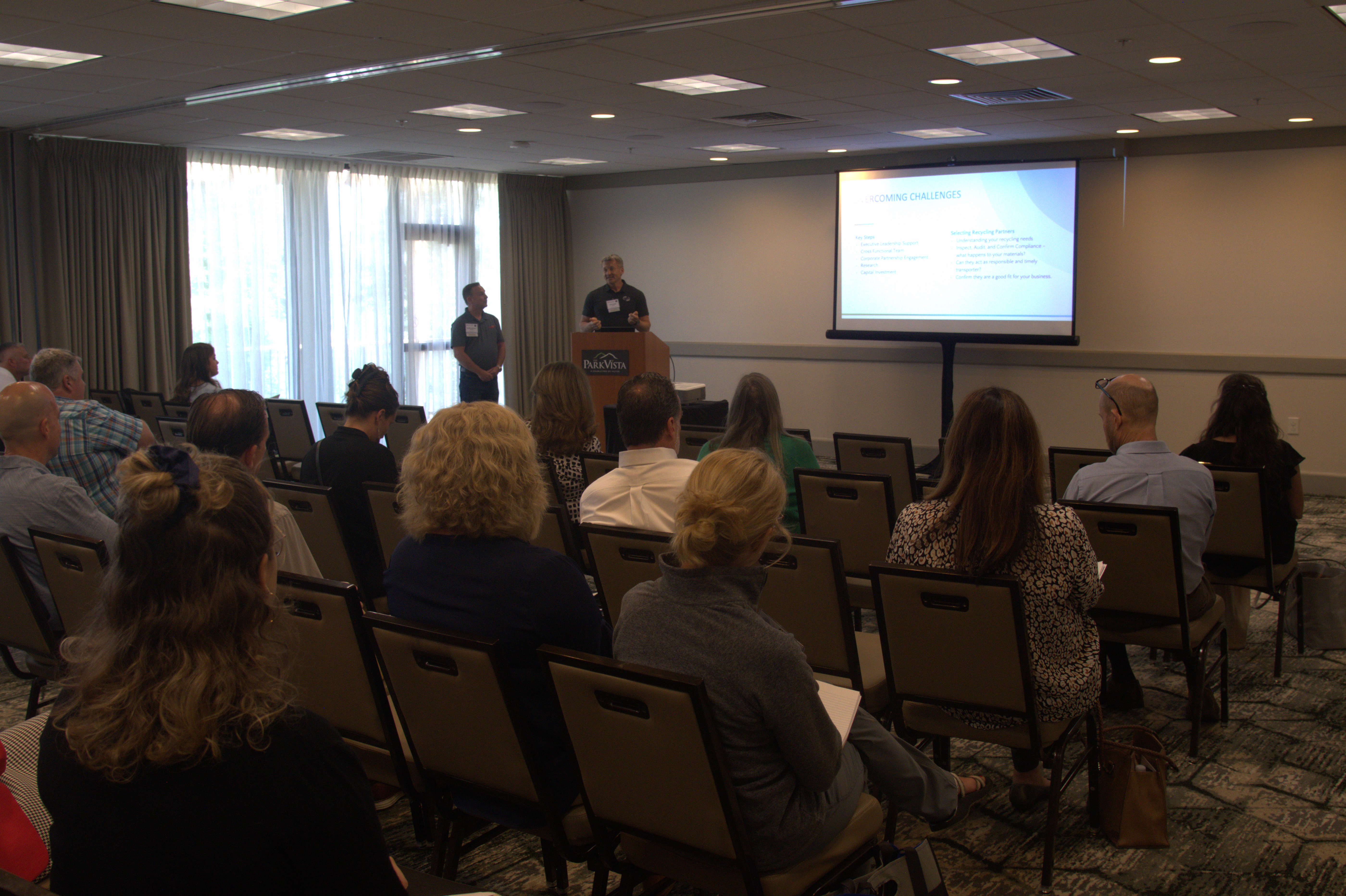 Conference presentation discussing the implementation and success of a large scale recycling program at Dollywood Parks & Resorts, attended by sustainability professionals.