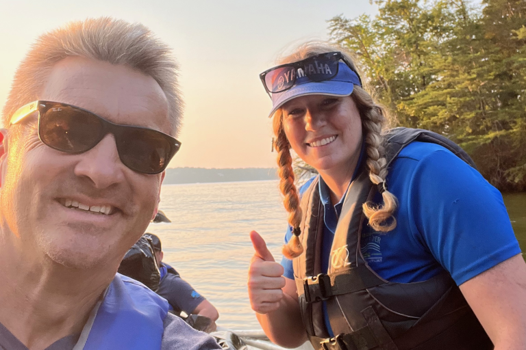 Volunteers pausing for a selfie during the Tennessee River Clean-Up